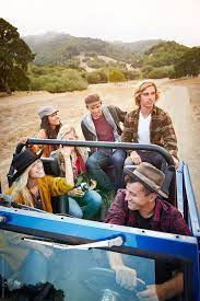 Group Of Friends On A Road Trip In Nature Having Fun By Trinette Reed For Stocksy United Road Trip Friends Adventures Group Of Friends