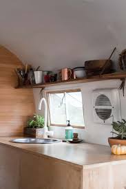 A Vintage Airstream Adventure On The Road Vintage Airstream Caravan Interior Vintage Caravan Interiors