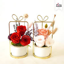 Maybe you would like to learn more about one of these? Love Embrace 3 Pink Roses Mini Flower Pot Surprise Delivery Singapore
