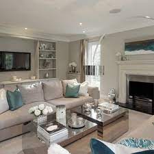 Expensive furniture price, dark or striking color selection and glowing decorations typically relate to this home interior design. Glam Living Room Ideas Photos Houzz
