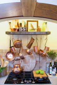 Turn on one of the stove burners to verify that the gas has been turned off. Decorating Dilemma How To Decorate Above Your Stove Nell Hills