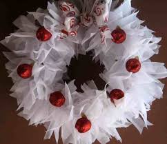 The white color wreath is perfect for the dark color of walls or doors; Pin On Wreath Ideas