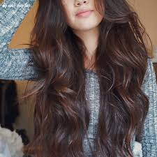 Gather all your hair, allowing some strays to fall loose. 10 Big Curls Long Hair Undercut Hairstyle