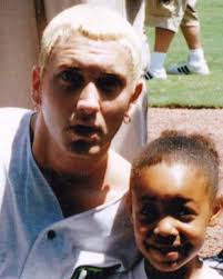 Eminem photographed with a young fan at the AI Lang Stadium (known then as  the Florida Power Park) in St. Petersburg, Florida, US,