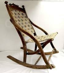 Identifying antique rocking chairs is difficult, but researching the unique characteristics of various styles and eras can help. Pin On My Antiques