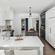 Charcoal Gray Island With White Cabinets White Wood Paneling White Cabinets Transitional Kitchen