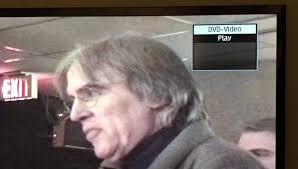 And musical director Michael Riesman plays the organ as a clip of the movie  was shown...