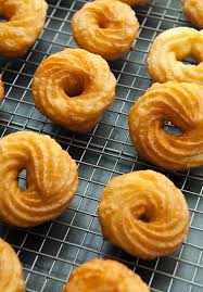 French Crullers Made With Few Ingredients Eggs Flour Water Butter Salt Sugar Doughnut Recipe Cruller Doughnut Recipe French Crullers