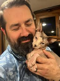 Meanwhile, dad's working that Anton LaVey beard.