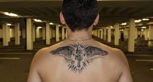 #black wings tattoo on guy's back. 13 Wing Tattoo Designs Ideas Design Trends Premium Psd Vector Downloads