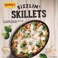 Denny S New Smoky Gouda Chicken Broccoli Skillet Roasted Seasoned Chicken With Caramelized Onions Sauteed Mushrooms And Broccoli Served Atop Whole Grain Rice Topped With Italian Cheeses And Gouda Cheese Sauce