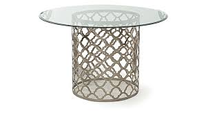 It rises on four faceted and tapered legs joined by spindles to a conforming, caned stretcher shelf. Quatrefoil Round Dining Table Decor Rest Furniture Ltd