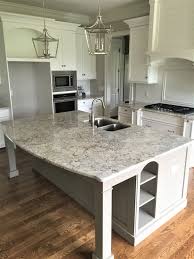 White ice granite, white subway tile with gray grout. White Granite Kitchen Countertops Hmdcrtn
