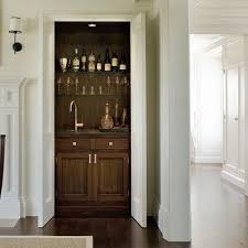 These living room bar cabinets are to die for. Hidden Living Room Bar Design Ideas