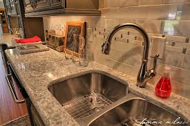 Uba tuba granite fabricated with a half bullnose edge installed on light wood cabinets with a 50/50 sink. Which Countertop Colors Match My Cabinets Spectrum Stone Designs