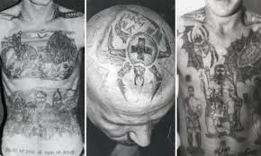 The meaning of these tattoos can range from the nature of the crime committed by the gangster to his personal aesthetic taste. Russian Criminal Tattoos In Pictures World News The Guardian