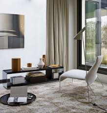 Multiuse small tables inspired, according to the words of the designer, by a painting by piet mondrian and the sculptures of donald judd, which skilfully combine different materials (wood and metal) and satin and glossy colours. Small Table Surface B B Italia Design By Vincent Van Duysen