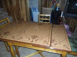 Painted metal chairs flank a metal tray table. Vintage Metal Top Kitchen Table Collectors Weekly