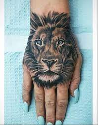 A Cute Lion Tattoos On Hand Lion Hand Tattoo Animal Tattoos Hand Tattoos