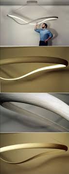 This Continuous Loop Of Bent Wood Emits Light From Embedded Leds Designer John Procario Has Taken His Love For Sculpture And Lighting Ic Tasarim Tasarim Lamba