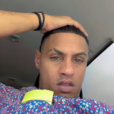 Lil Wayne with the police officer, "Uncle Bob," who saved his life when he  was 12 years old