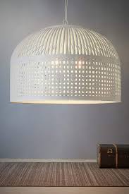 Select a matte white or matte black shade to complete the look. Esch Woven Iron Strips Pendant Extra Large White Zaf10404