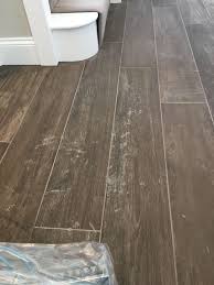 For wood flooring you can call us. Removing Polymer Grout Haze From Wood Effect Ceramic Tiles In Guildford West Surrey Tile Doctor