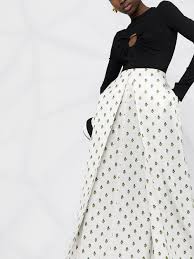 Experte sagt, sie ist „die disruptivste aktie der welt. Floral Print Long Skirt Editorialist
