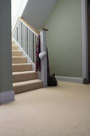 Use Soft Shades For Subtle Style In A Welcoming Staircase Stairs Hallway Design Interior Cream Carpet Living Room Carpet Room Carpet Trendy Living Rooms