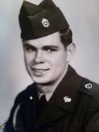 He sent this pic home, to show his scarwaf patch.