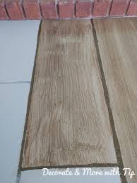 How I Painted Stained My Concrete Floor To Look Like Wood Painted Concrete Porch Concrete Floors Painted Concrete Floors