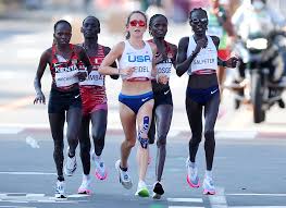 Molly seidel, of united states, stands on the podium for a flower ceremony following her third place finish in the women's marathon at the 2020 summer olympics, saturday, aug. Owpaxbjfzgaegm