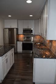 We did not find results for: White Shaker Kitchen With New Dark Grey Laminate Flooring Contemporary Kitchen Dc Metro By Nova Design And Build Houzz