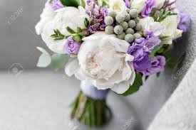 We did not find results for: Brides Wedding Bouquet With Peonies Freesia And Other Flowers On Black Arm Chair Light And Lilac Spring Color Morning In Room Stock Photo Picture And Royalty Free Image Image 99726157