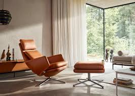 The reclining chair and matching stationary ottoman are upholstered in bonded leather for top quality and lasting comfort. Vitra Grand Relax Lounge Chair Leather Cognac Polished Base Felt Glides Heal S Uk