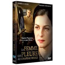 La femme qui pleure au chapeau rouge