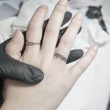 15th of april this oval statement ring is personalized with your birth flower on front, and personalization the back. Cool Tattoo Ideas For Men And Women The Wild Tattoo Design Pictures 2019 Conceptions De Tatouage D Anneau Tatouage Couple Tatouage Alliance