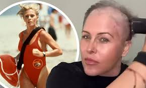 Baywatch bombshell Nicole Eggert, 52, shaves her head amid battle with  'very rare' form of breast cancer