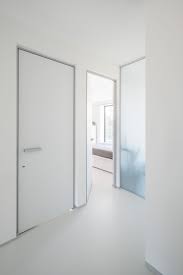 From white cottage internal doors to white internal doors with glass. Modern White Interior Doors With Minimal Anodized Aluminium Door Frames And Handles Anywaydoors White Interior Doors Doors Interior Doors Interior Modern