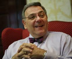 SHU's interim president has experience behind bow tie