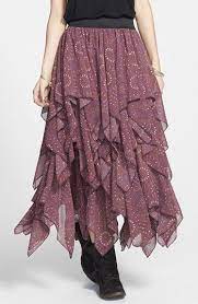 The hem resembles a handkerchief that is held by the centre so that its corners hang down as points. 12 Handkerchief Skirt Ideas Handkerchief Skirt Skirts Clothes