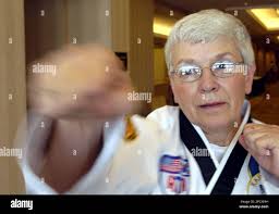 ADVANCE FOR SUNDAY, JUNE 25 ** Sally Burke, 64, of Cape Canaveral, Fla.,  warms up Thursday, June 22, 2006, before she tests for her fourth-degree  black belt and competes at the