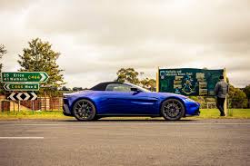 Image result for Concours Blue 2021 Aston Martin