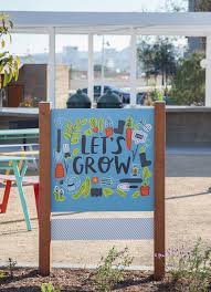 A Community Built Around Parks And Family Friendly Fun In Irvine California Signage Design Environmental Graphic Design Parking Design