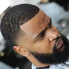 While you can pull off this hairstyle with a varying level of tapered fades, we love the layered look of a bald fade. Pin On Haircuts For Black Men