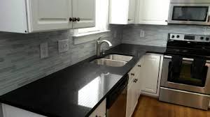 15 Stunning Quartz Countertop Colors To Gather Inspiration From Black Countertops Black Kitchen Countertops Black Marble Countertops