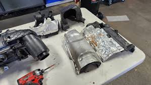 Quieter between Tial Q50mm and Procharger Red Race Valve?