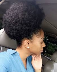For the first packing gel style, the hair was first arranged in a braid that was then twisted around to create a messy bun. 16 Best Centre Part With Packing Gel Ideas Natural Hair Styles Curly Hair Styles Hair Beauty