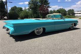 Image result for Turquoise 1960 Oldsmobile
