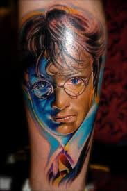 Tattooed onto his left upper arm. Amazing Harry Potter Tattoo